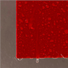 Röd fasadskiva med en slät yta, närbild
