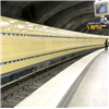 Trygga Tunnlar Emaljsystem med perforerade kassetter på perrong- och spårväggar på Fridhemsplans tunnelbanestation, Stockholms