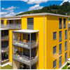Rockpanel Colours fasadskivor i gula nyanser på fasad